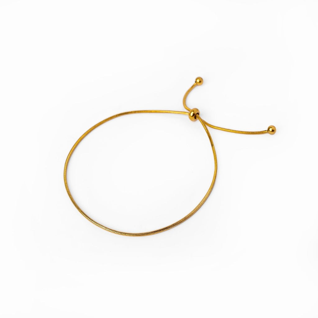 Image of the Glamour Gleam Bracelet – a radiant 18K gold stainless steel bracelet with shimmering details, perfect for elegant, glamorous looks.

