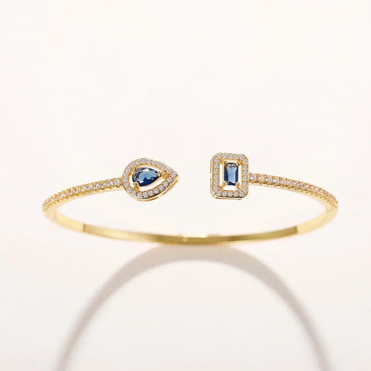 Image of the Graceful Elegance Bracelet – a refined 18K gold stainless steel bracelet with timeless, elegant design for day or night wear.

