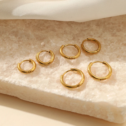 Victoria Hoops, classic and chic hoop earrings that add sophistication and elegance to any outfit.