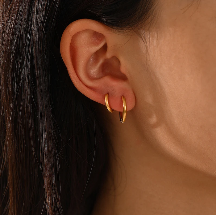 Victoria Hoops, classic and chic hoop earrings that add sophistication and elegance to any outfit.