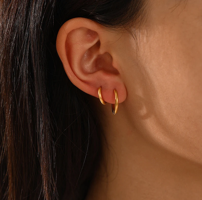 Victoria Hoops, classic and chic hoop earrings that add sophistication and elegance to any outfit.